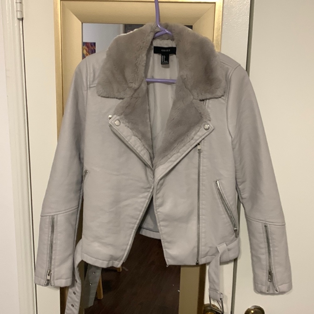 Faux leather jacket with fur lined neck and opening